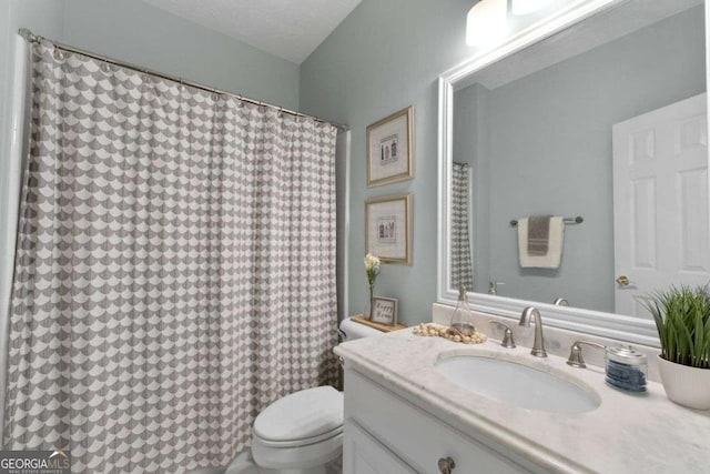 3027 Biltmore Woods Dr, Buford, GA 30519 - bathroom featuring toilet, vanity, and a shower with shower curtain