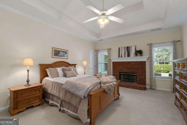 3027 Biltmore Woods Dr, Buford, GA 30519 - bedroom featuring light colored carpet, a raised ceiling, baseboards, a fireplace, and ornamental molding