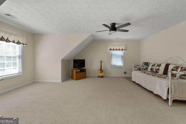 3027 Biltmore Woods Dr, Buford, GA 30519 - bedroom with a textured ceiling, carpet flooring, a ceiling fan, and baseboards