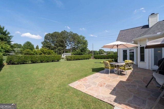 3027 Biltmore Woods Dr, Buford, GA 30519 - view of green lawn with a patio area and french doors