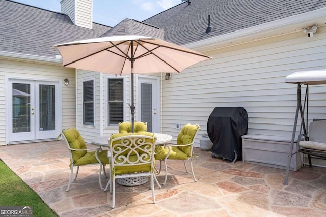 3027 Biltmore Woods Dr, Buford, GA 30519 - view of patio with french doors, a grill, and outdoor dining space