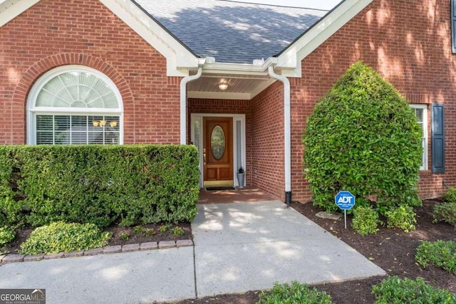 3027 Biltmore Woods Dr, Buford, GA 30519 - entrance to property featuring brick siding and roof with shingles