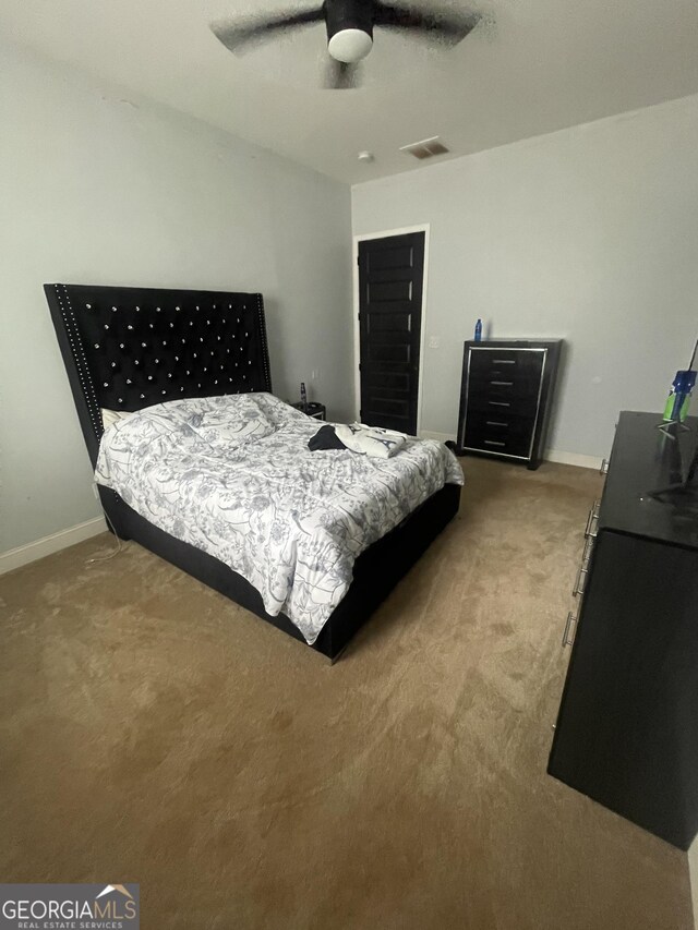 1333 Happy Hill Rd, Carrollton, GA 30116 - bedroom featuring carpet floors, baseboards, and ceiling fan