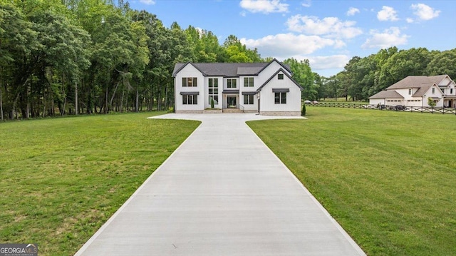 1604 Greendale Rd, Covington, GA 30014 - modern inspired farmhouse featuring a front yard