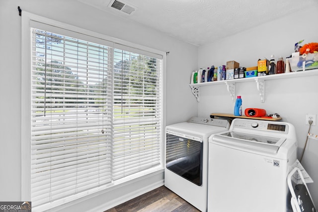 70 Otara Woods Ct, Newnan, GA 30263 - laundry room featuring independent washer and dryer, wood finished floors, and a textured ceiling