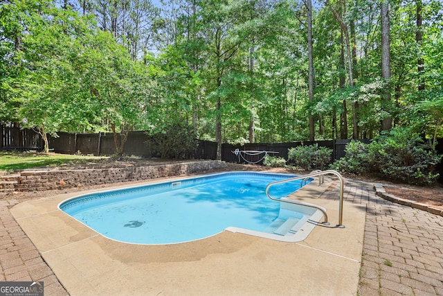 70 Otara Woods Ct, Newnan, GA 30263 - view of pool featuring a fenced backyard and a patio area