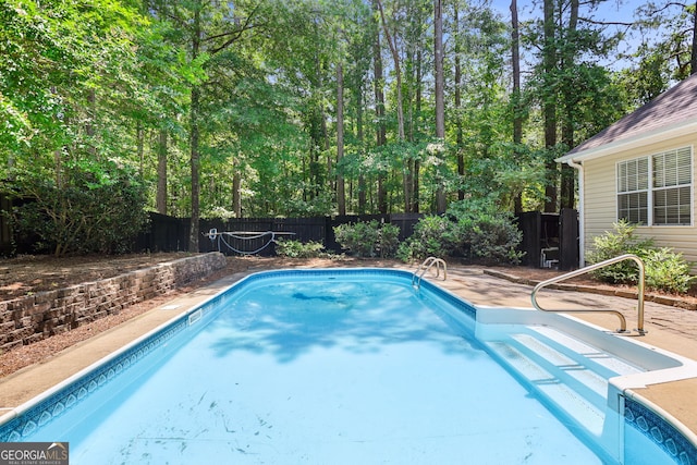 70 Otara Woods Ct, Newnan, GA 30263 - view of swimming pool featuring a fenced backyard