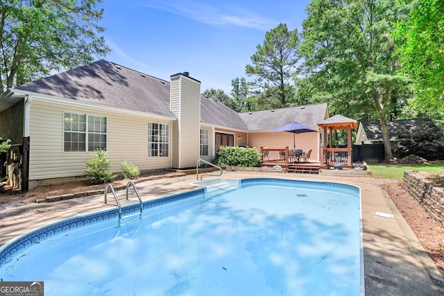 70 Otara Woods Ct, Newnan, GA 30263 - outdoor pool featuring a wooden deck and a gazebo