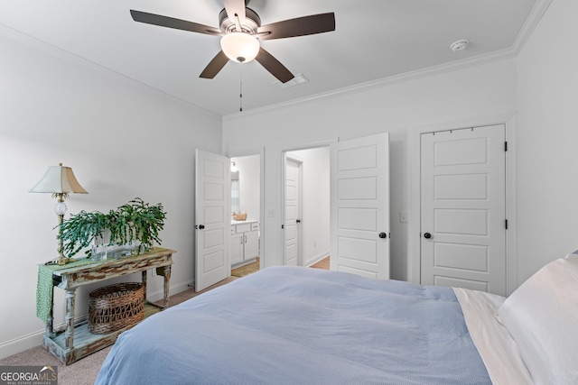 2036 Jefferson Hall Dr, Monroe, GA 30656 - carpeted bedroom featuring ornamental molding, connected bathroom, and ceiling fan