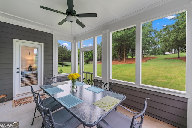 2036 Jefferson Hall Dr, Monroe, GA 30656 - sunroom / solarium with a ceiling fan and outdoor dining area