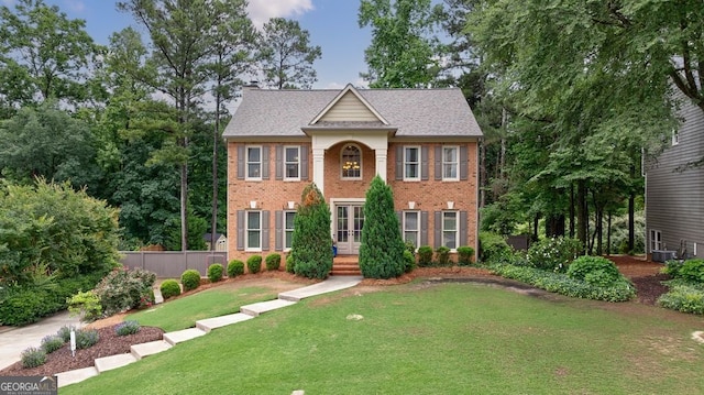 405 Woodbrook Way, Lawrenceville, GA 30043 - colonial-style house with brick siding and central AC unit