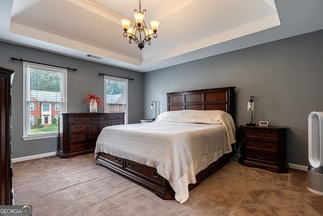 405 Woodbrook Way, Lawrenceville, GA 30043 - bedroom featuring a tray ceiling, light carpet, baseboards, and a chandelier