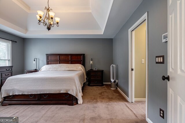 405 Woodbrook Way, Lawrenceville, GA 30043 - bedroom featuring a raised ceiling, a chandelier, carpet, and baseboards