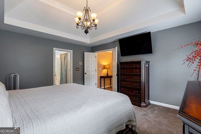 405 Woodbrook Way, Lawrenceville, GA 30043 - bedroom with a tray ceiling, carpet, a chandelier, and baseboards