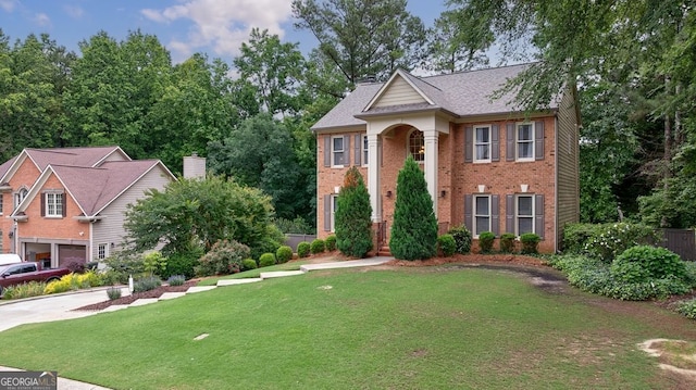 405 Woodbrook Way, Lawrenceville, GA 30043 - view of front of house featuring a front lawn and brick siding