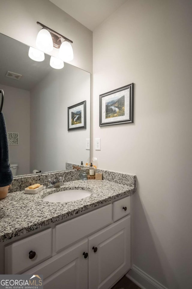 35 Westwood St, Danielsville, GA 30633 - bathroom featuring vanity and toilet