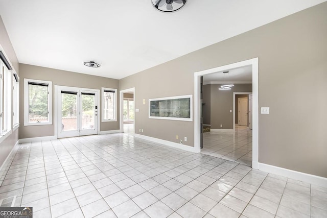107 Julee Emilyn Dr, Bonaire, GA 31005 - spare room featuring light tile patterned flooring and baseboards