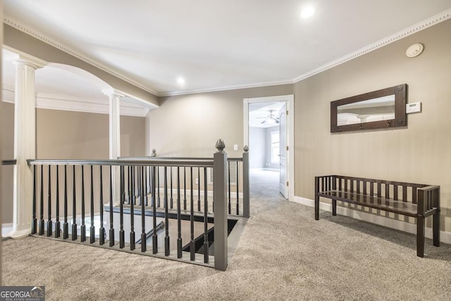 107 Julee Emilyn Dr, Bonaire, GA 31005 - corridor with decorative columns, an upstairs landing, carpet flooring, crown molding, and baseboards