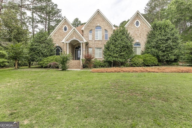 107 Julee Emilyn Dr, Bonaire, GA 31005 - view of front of property with brick siding and a front lawn