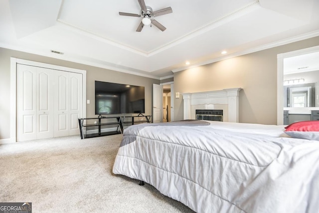 107 Julee Emilyn Dr, Bonaire, GA 31005 - bedroom featuring a raised ceiling, ornamental molding, carpet flooring, recessed lighting, and a ceiling fan