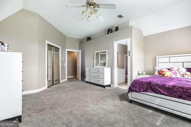 107 Julee Emilyn Dr, Bonaire, GA 31005 - carpeted bedroom featuring lofted ceiling, baseboards, ensuite bath, and a ceiling fan