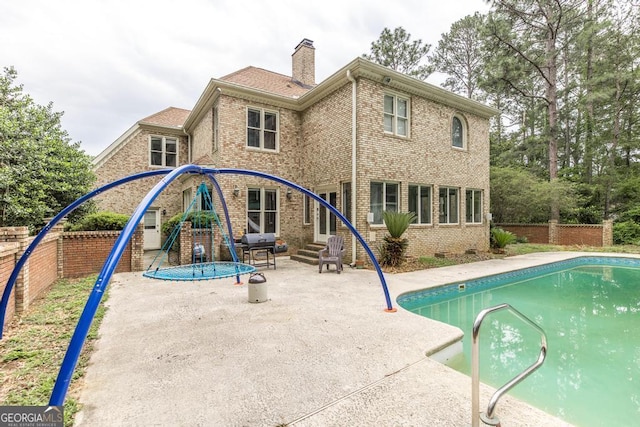 107 Julee Emilyn Dr, Bonaire, GA 31005 - view of pool featuring entry steps, a patio, and a fenced backyard
