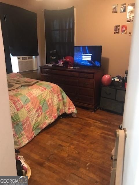 125 Jones St, Summerville, GA 30747 - bedroom featuring wood finished floors and cooling unit