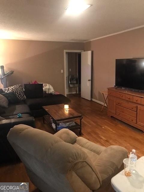 125 Jones St, Summerville, GA 30747 - living area featuring light wood-style flooring, ornamental molding, baseboards, and heating unit