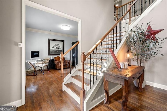 501 Rabun Ct, Canton, GA 30115 - staircase with ornamental molding, wood finished floors, and baseboards
