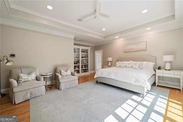 3894 Land O Lakes Dr NE, Atlanta, GA 30342 - bedroom featuring a tray ceiling, wood finished floors, recessed lighting, crown molding, and ceiling fan