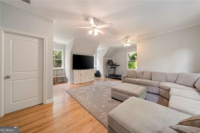 3894 Land O Lakes Dr NE, Atlanta, GA 30342 - living area with a ceiling fan, light wood-type flooring, and ornamental molding