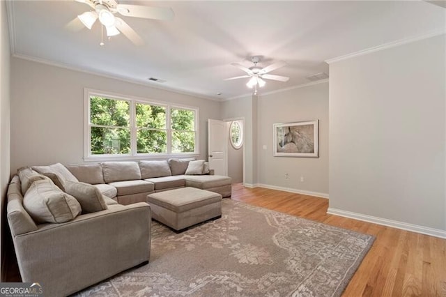 3894 Land O Lakes Dr NE, Atlanta, GA 30342 - living area featuring ceiling fan, wood finished floors, and crown molding
