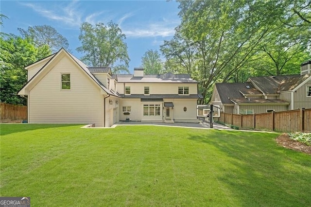 3894 Land O Lakes Dr NE, Atlanta, GA 30342 - back of house featuring a patio area