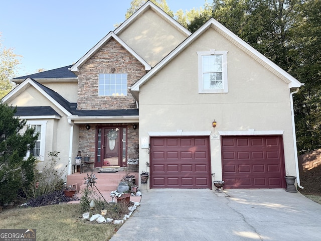 3668 Deer Springs Pkwy, Ellenwood, GA 30294 - view of front of property featuring stone siding, stucco siding, concrete driveway, and an attached garage