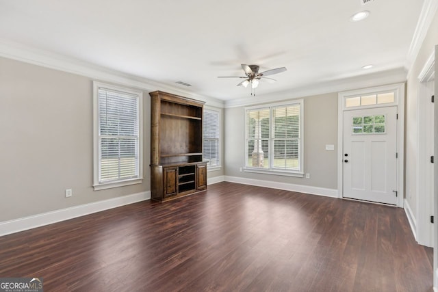 625 Henderson Mill Rd, Covington, GA 30014 - unfurnished living room featuring a ceiling fan, ornamental molding, baseboards, dark wood-style flooring, and recessed lighting