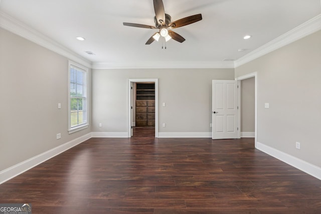 625 Henderson Mill Rd, Covington, GA 30014 - spare room with crown molding, ceiling fan, dark wood finished floors, baseboards, and recessed lighting