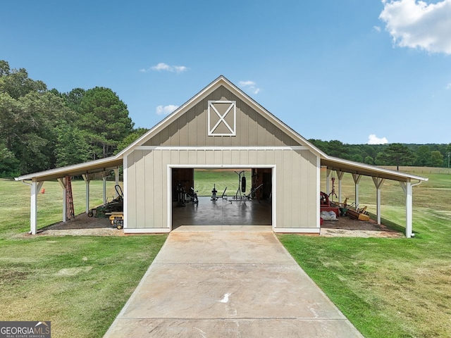 625 Henderson Mill Rd, Covington, GA 30014 - view of pole building featuring a lawn and concrete driveway