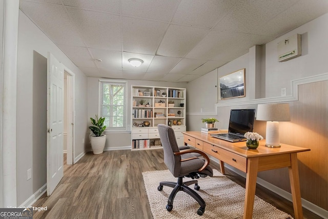 42 Breckenridge Dr, Powder Springs, GA 30127 - office space featuring wood finished floors, a drop ceiling, and baseboards