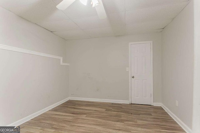 42 Breckenridge Dr, Powder Springs, GA 30127 - spare room with a drop ceiling, wood finished floors, and ceiling fan