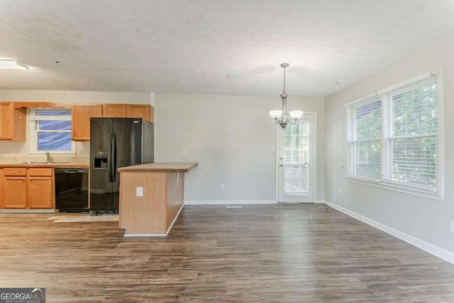 42 Breckenridge Dr, Powder Springs, GA 30127 - kitchen with black appliances, a sink, dark wood-style floors, a chandelier, and baseboards