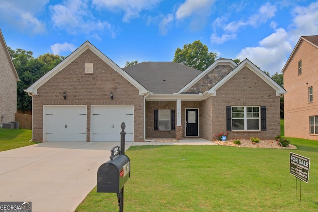 1243 Polk Xing, Mcdonough, GA 30252 - craftsman-style home with brick siding, concrete driveway, an attached garage, and a front yard