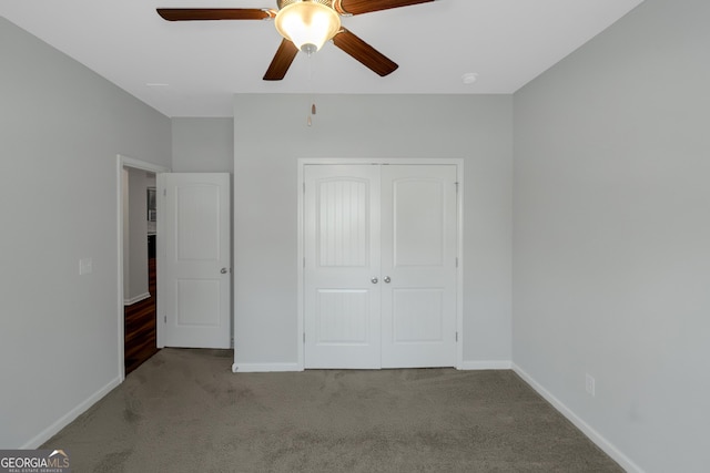 1243 Polk Xing, Mcdonough, GA 30252 - unfurnished bedroom with carpet floors, a closet, and a ceiling fan