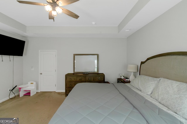 1243 Polk Xing, Mcdonough, GA 30252 - carpeted bedroom with a ceiling fan and a raised ceiling