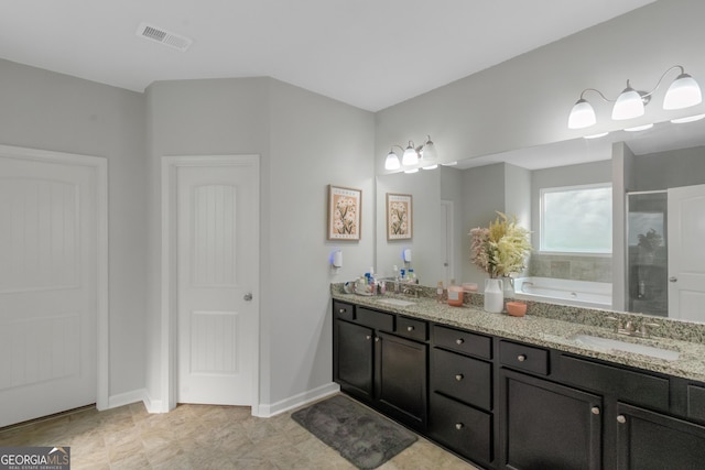 1243 Polk Xing, Mcdonough, GA 30252 - full bath featuring a garden tub, double vanity, and a shower stall