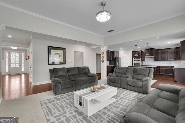 2740 Longacre Park Way, Lawrenceville, GA 30044 - living room with ornate columns, crown molding, dark wood-style flooring, baseboards, and recessed lighting