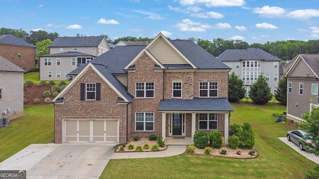2740 Longacre Park Way, Lawrenceville, GA 30044 - traditional-style home featuring brick siding, concrete driveway, an attached garage, and a front lawn