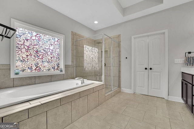 2740 Longacre Park Way, Lawrenceville, GA 30044 - bathroom with a bath, a stall shower, vanity, tile patterned floors, and baseboards