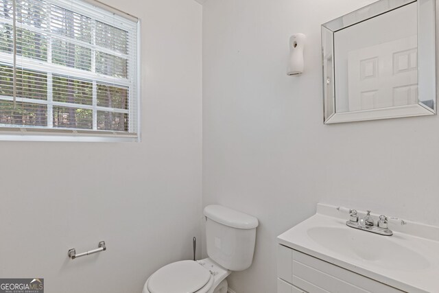 1450 Steam Engine Way NE, Conyers, GA 30013 - half bathroom with toilet and vanity