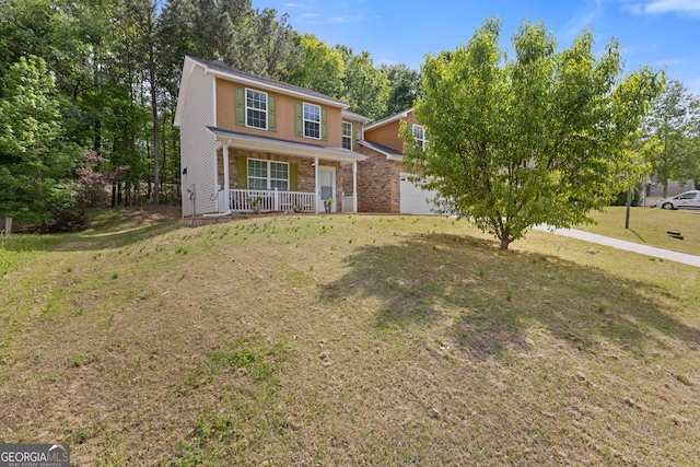 1450 Steam Engine Way NE, Conyers, GA 30013 - traditional-style house with covered porch, a front lawn, stone siding, and an attached garage