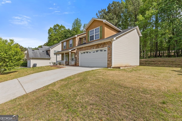 1450 Steam Engine Way NE, Conyers, GA 30013 - view of front of property with stone siding, an attached garage, driveway, and a front lawn